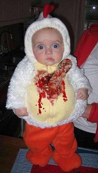 A Baby Wearing An Alien Costume A Baby Wearing An Alien Costume