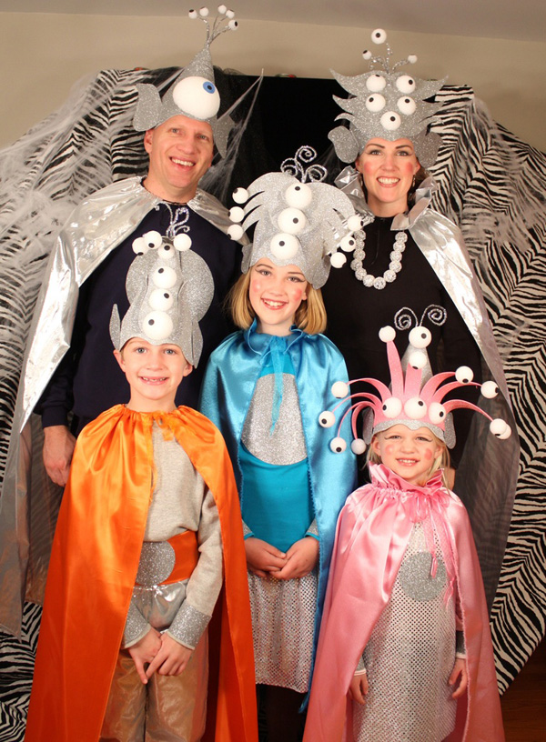 A Family Wearing Alien Costumes A Family Wearing Alien Costumes