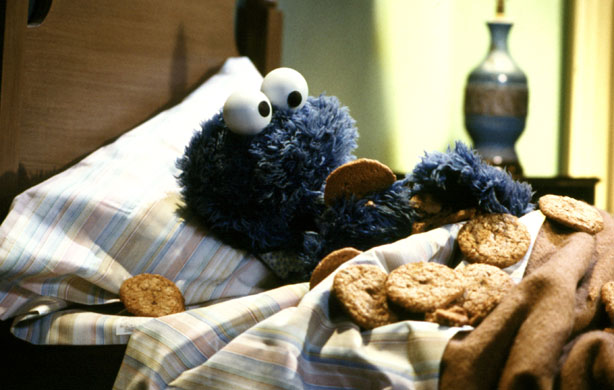 Cookie Monster In Bed With Some Cookies